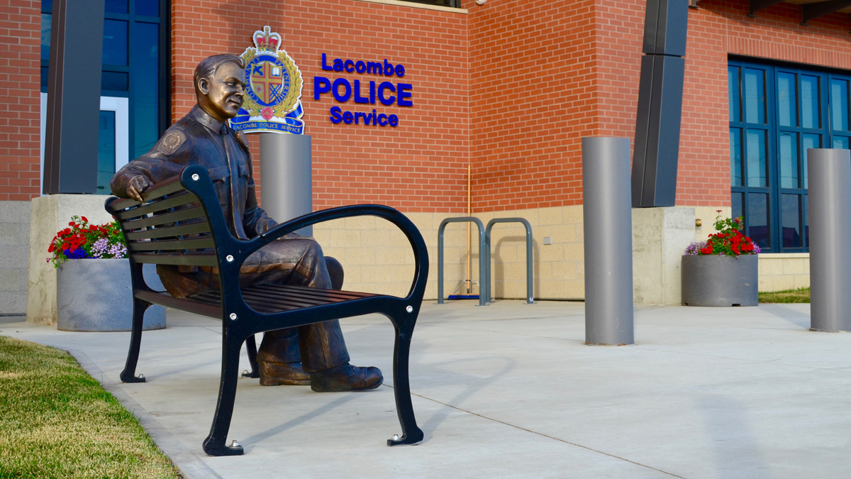 Wishbone Bench & Bronze Sculpture by Nathan Scott for the Lacombe Police Station