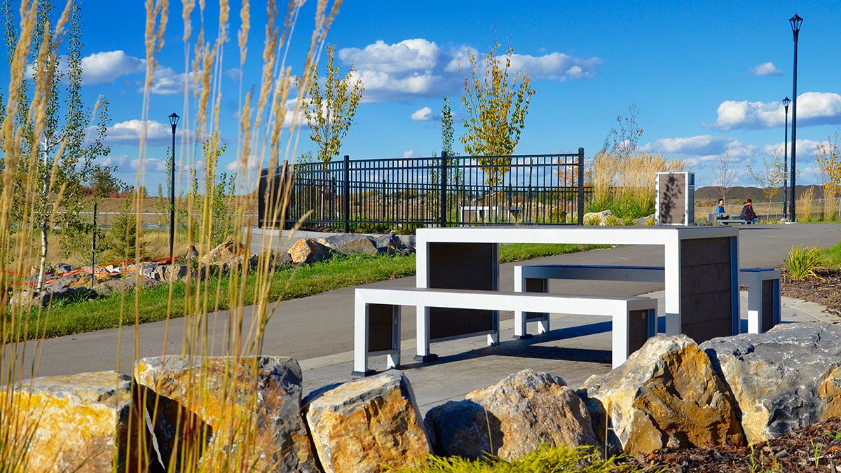 This past Fall we had the pleasure of installing benches, tables and receptacles in the newly completed Derocher Park in Edmonton Alberta. The concept behind the park is to bring a space for nature to intertwine with the neighborhood.